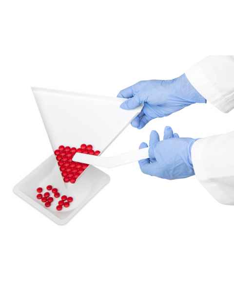 Heathrow Scientific Pill Counting Tray shown in use with spatula and square weighing boat, which is NOT included.
