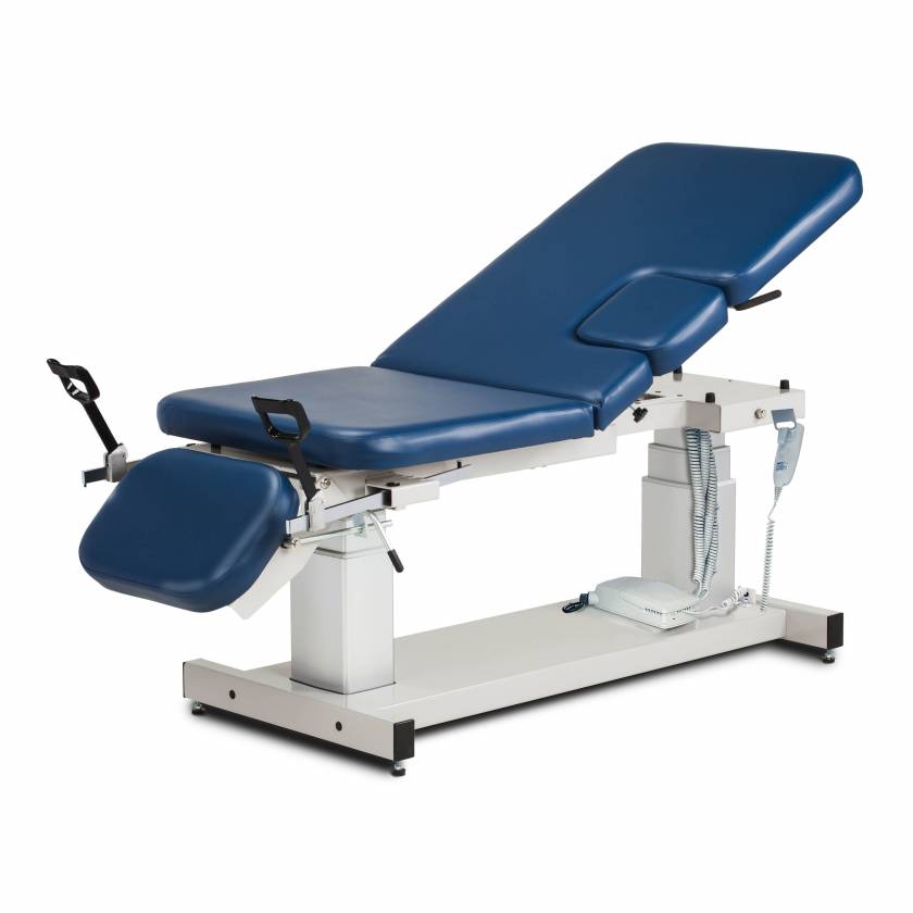 The Clinton 27" Wide Multi-Use Power Imaging Trendelenburg Table with Stirrups & Drop Window, Model 80079, is shown in the picture. Model 80079-X has a 34" width.