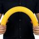 CanDo® 10-1521 Twist-Bend-Shake® Flexible Exercise Bar, 24" Length, X-Light Resistance, Yellow - Bending the Bar