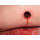3B Scientific 1023106 Hemorrhage Control Leg Trainer - Light Skin Tone, Round Wound Close-Up View