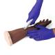 3B Scientific 1023312 Suture Practice Arm - Dark Skin Tone, Showing Stapling (Surgical Stapler not included)