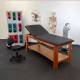 CanDo® 15-4225 Quickship Treatment Table with Adjustable Back and Shelf, Black Top (Additional items pictured are not included and are shown for illustrative purposes only.)