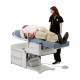 Brewer 6001PLUS-PR46 Access® High-Low PLUS Exam Table with Pneumatic Back, Pelvic Tilt, and Drawer Heater, Blue Fog Upholstery, Flat- with Patient (The Footrest Pad and EasyGlide™ Mobility System is Sold Separately)