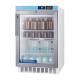 Accucold Pharmaceutical Series ADA Vaccine Built-in All-Refrigerator with NIST-Calibrated Temperature Display, 3 Wire Shelves, Glass Door - 2.65 Cubic Feet, Left Angle with Beakers, Jars, and Bottles (The Beakers, Jars, and Bottles are not included)