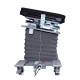 The photo shows the Surgical Tables Inc. Bariatric C-Arm Imaging Table Model BT-5 in lateral tilt motion.