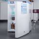 Accucold Compact All-Refrigerator with Front Control Panel, 2 Wire Shelves, Solid Door, 2.4 Cubic Feet - Left Angle, Door Opened with Bottles and a Beaker (Bottles and Beaker are not included)