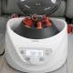 Globe Scientific GCC-P Portable Clinical Centrifuge - In a Car Seat with Test Tubes, Digital Display showing process in progress (Test tubes are sold separately)